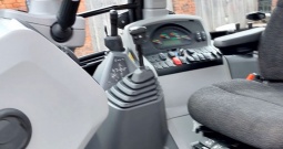 Kombinirka Caterpillar 434F2