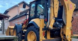 Kombinirka Caterpillar 434F2