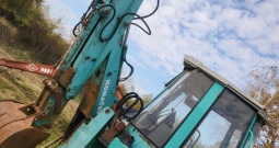 Kombinirka Komatsu Fai, 1998.g., zglobna