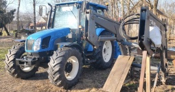 New Holland TL90 sa prednjim utovarivačem i gajbom