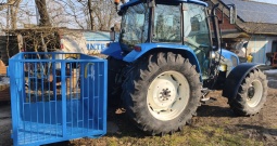 New Holland TL90 sa prednjim utovarivačem i gajbom