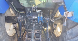 New Holland TL90 sa prednjim utovarivačem i gajbom