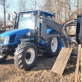 New Holland TL90 sa prednjim utovarivačem i gajbom