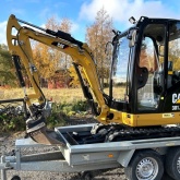 2013 Bager CAT 301.7D + transportna prikolica