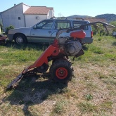 Traktor H,ako sa kosilicom